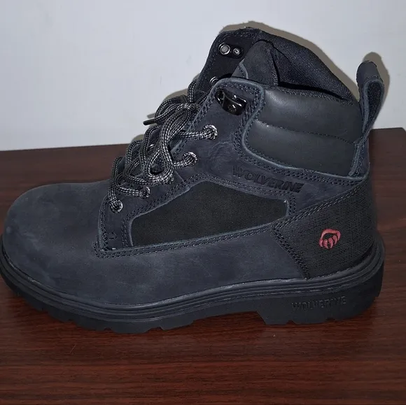A pair of mens black Wolverine Steel Toe work boots NWOB in a size 8M.