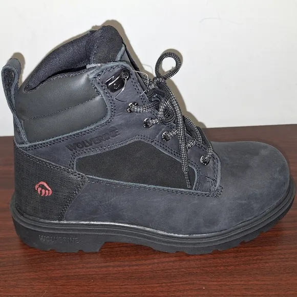 A pair of mens black Wolverine Steel Toe work boots NWOB in a size 8M.
