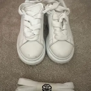 Alexander McQueen White Sneakers Minimalist Design