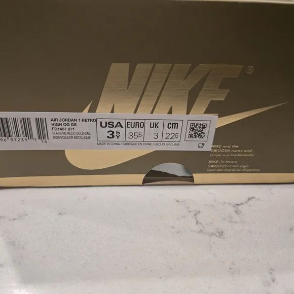 Black and Gold High-Top Sneakers