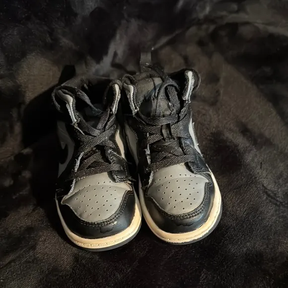 Black and Gray High-Top Sneakers with Red Accent