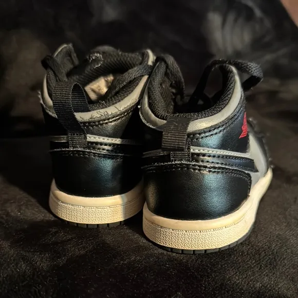 Black and Gray High-Top Sneakers with Red Accent