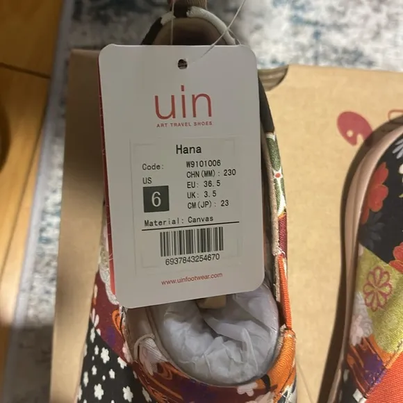 🍁👜Brand New Canvas UIN walking shoes. Fall floral accent. See photos attached.