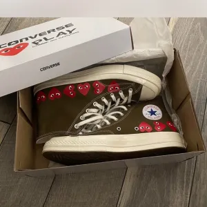 Converse men’s Olive and Red High-Top Sneakers