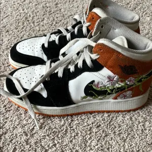 Embroidered High-Top Sneakers