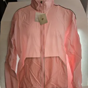 Fabletics Oversized Flyweight Windbreaker in &quot;Pretty Pink&quot; Size L