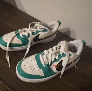 Green and White Sneakers with Perforated Leather Design