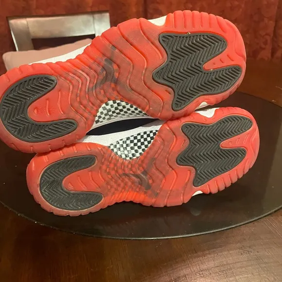 Jordan 11 Black and Red Sneakers with Patent Leather