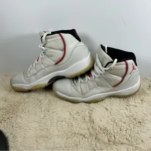 Jordan 11 White and Red High-Top Sneakers