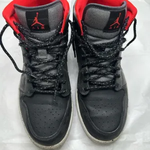Jordan Black and Red High-Top Sneakers with Signature Jumpman