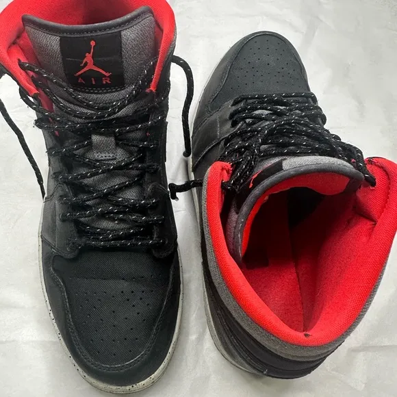 Jordan Black and Red High-Top Sneakers with Signature Jumpman
