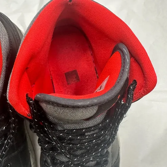 Jordan Black and Red High-Top Sneakers with Signature Jumpman