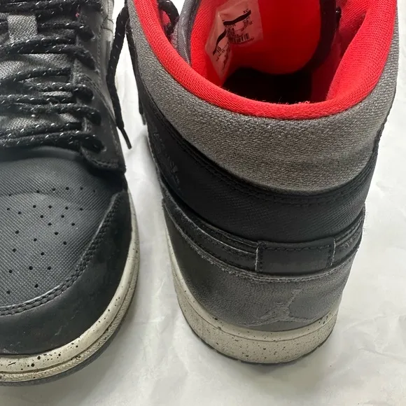 Jordan Black and Red High-Top Sneakers with Signature Jumpman