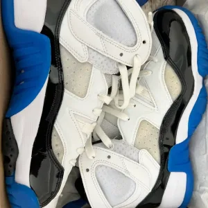 Jordan White and Blue Retro Sneakers
