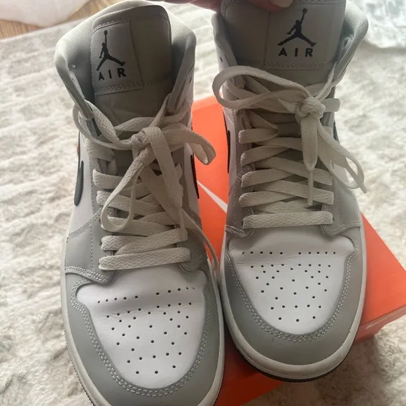 Jordan White and Gray Athletic Shoes with Iconic Design