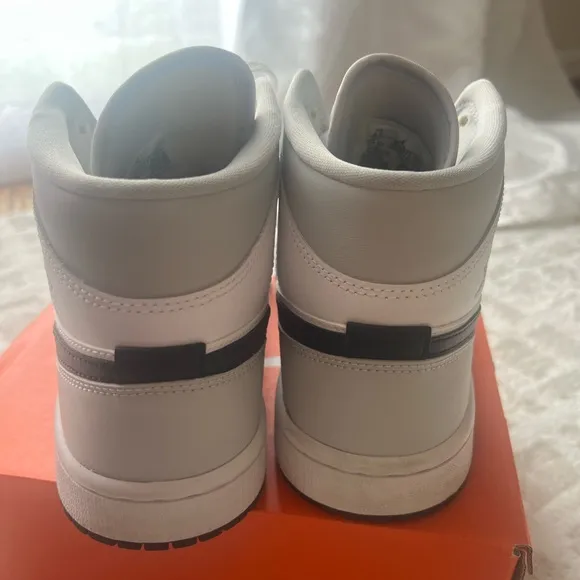 Jordan White and Gray Athletic Shoes with Iconic Design
