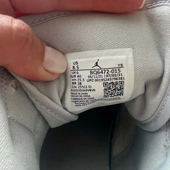 Jordan White and Gray Athletic Shoes with Iconic Design