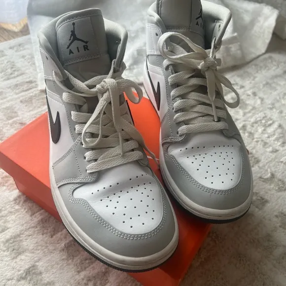 Jordan White and Gray Athletic Shoes with Iconic Design