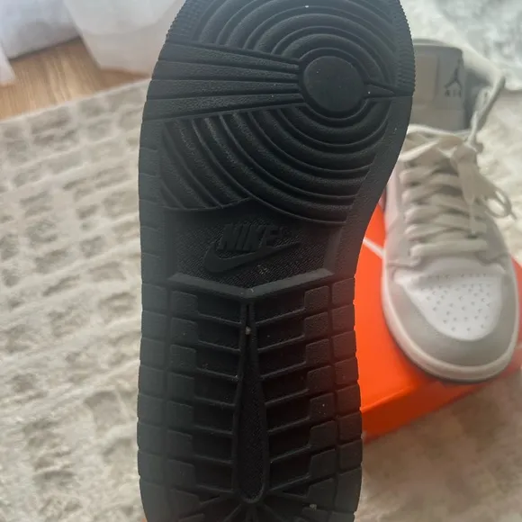 Jordan White and Gray Athletic Shoes with Iconic Design