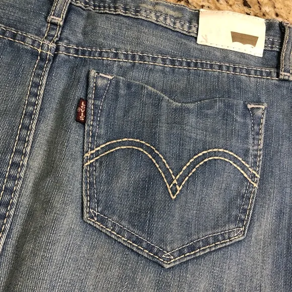 Levi’s Medium Denim Distressed Mini Skirt 26