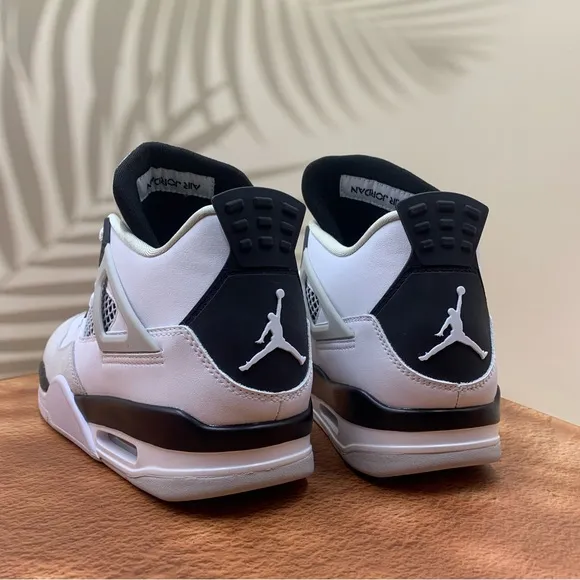 Man’s Size 10.5 Military Black Jordan 4 White and Black Sneakers