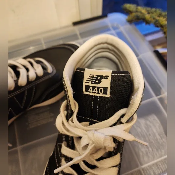New Balance 440 men's high-top sneakers.