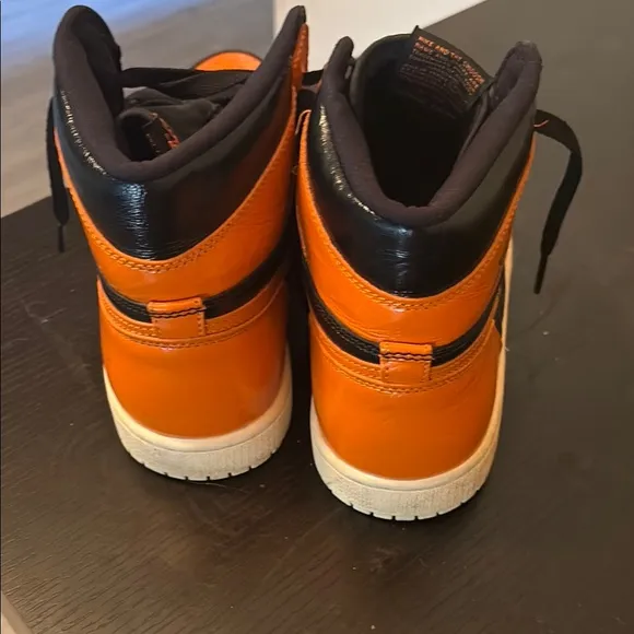 Nike Air Black and Orange High-Top Sneakers
