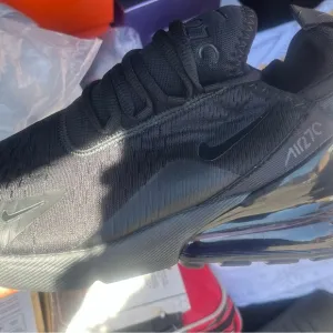 Nike Black Air Max Athletic Shoes with Streamlined Design