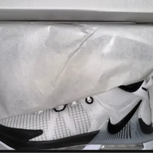 Nike Black and White Athletic Shoes with Mesh Upper