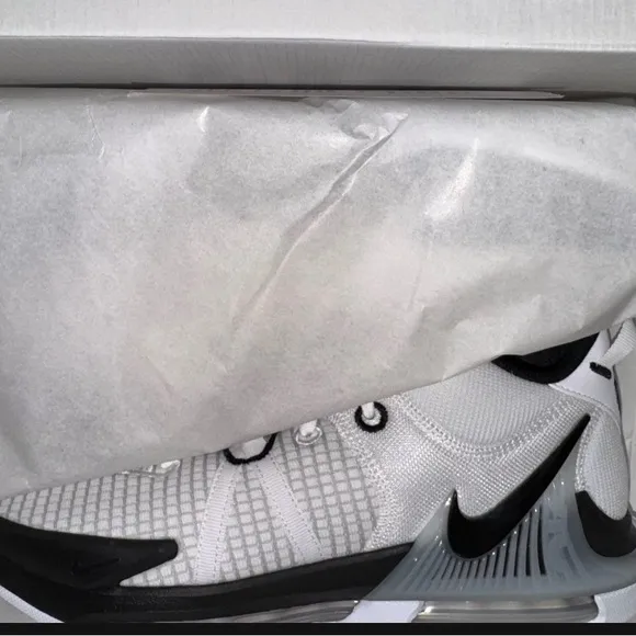 Nike Black and White Athletic Shoes with Mesh Upper