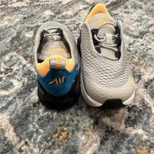 Nike Gray and Yellow Sneakers with Breathable Mesh