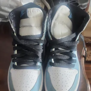 Nike High-Top Sneakers in Blue and White