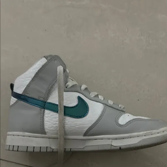 Nike High-Top Sneakers with Blue Swoosh