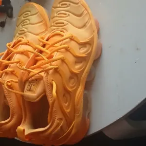 Nike Orange Chunky Sneakers with Sculptural Design