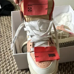 Off-White High-Tops in Pink and Cream