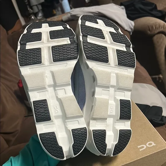 On Running Green and Blue Athletic Shoes with CloudTec Technology