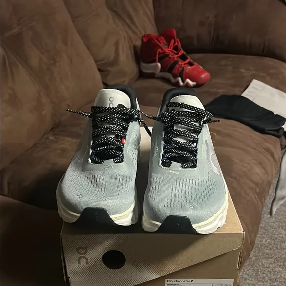 On Running Green and Blue Athletic Shoes with CloudTec Technology
