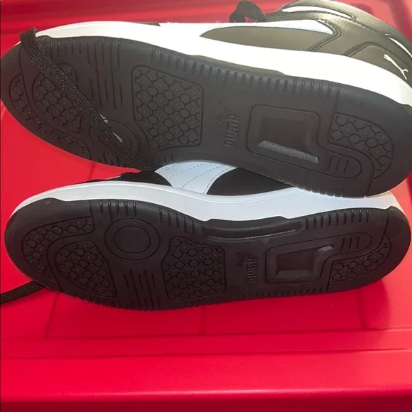 Puma Black and White Sneakers with Chunky Collar and Retro Style