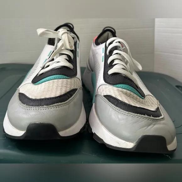 Puma White and Black Sneakers Retro-Inspired Design
