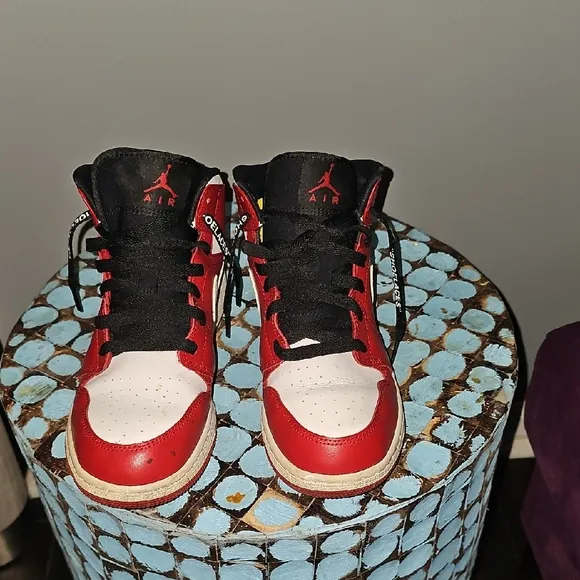 Red and White Nike Air Jordans High-Top Sneakers