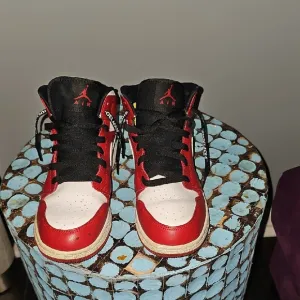 Red and White Nike Air Jordans High-Top Sneakers