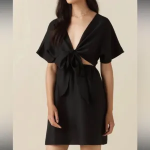 VETTA L The Convertible Wrap Mini Dress in black linen blend