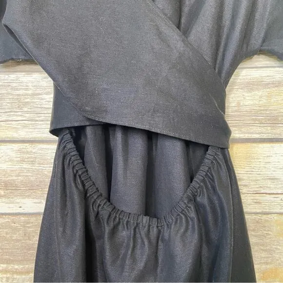 VETTA L The Convertible Wrap Mini Dress in black linen blend