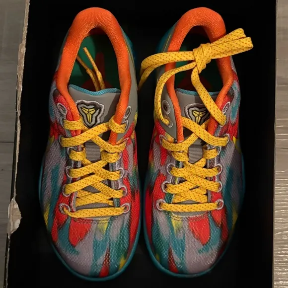 Vibrant Yellow and Red Athletic Shoes for Dynamic Performance