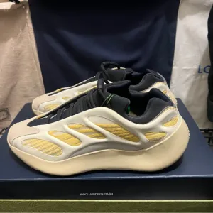 Yeezy Black and Yellow Sneakers Futuristic Design