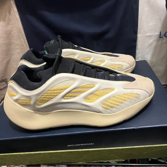 Yeezy Black and Yellow Sneakers Futuristic Design
